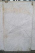 A white Carrara marble panel, (sold by order of the Community and Trustees of Downside Abbey),