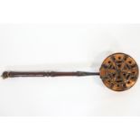 A late 17th century brass and wrought iron bed pan fumigator with turned handle,