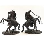 A pair of bronze Marley Horses, over signed Coustou, circa 1900,
