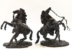 A pair of bronze Marley Horses, over signed Coustou, circa 1900,