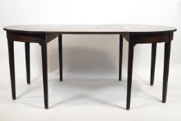 A 'D' end dining table in mahogany,