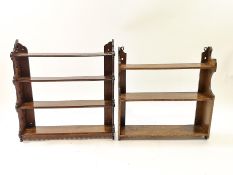 Two oak hanging wall shelves, the larger with four shelves,