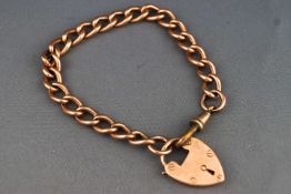 A rose metal curb link bracelet with padlock clasp and gold plated swivel.