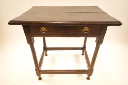 A 17th century and later oak side table, fitted frieze drawer,
