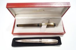 A Shaeffer 675 Medium fountain pen, boxed, together with a Dupont ball point pen,