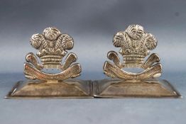 A pair of white metal menu holders for the Ceylon Mounted Rifles,