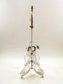 A 20th century telescopic oil lamp, converted to electricity, painted white,