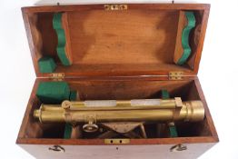 A Throughton and Simms brass theodolite, No 19527, on adjustable three arm base,