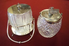 Two electroplated mounted glass biscuit barrels together with a teapot and hot water jug