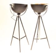 A pair of industrial style uplighters, with large semi circular shades, 137cm high,