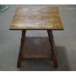 A Victorian mahogany occasional table on turned legs linked by an under tier on square feet,