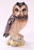 A Royal Doulton short eared owl Whyte & Mackay 200ml (with ullage), spirit flagon,