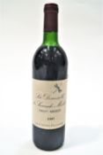 A bottle of La Demoiselle De Sociando Mallet Haut Medoc 1987 75 cl 12 % vol