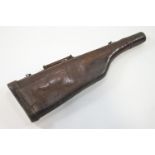 A 19th Century leather gun case with brass lock,