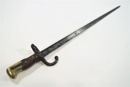 A 19th century French Le Bel Bayonet with wood and brass handle,