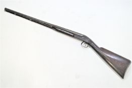 An 1860's 38 inch barreled percussion muzzle loader shot gun, hammer missing, nipple damaged,