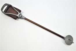 A shooting stick of usual form with aluminium handle and leather seat