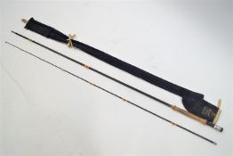 A new and unused Hardy fibre glass fly rod E/Y written on it in the usual Hardy white script,