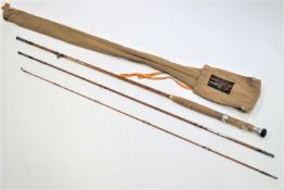 A Sealey all round split cane rod and bag