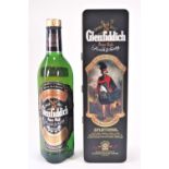 A Glenfiddich Special Old Reserve 'Clans of the Highlands of Scotland' tin and full bottle,