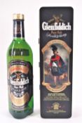 A Glenfiddich Special Old Reserve 'Clans of the Highlands of Scotland' tin and full bottle,