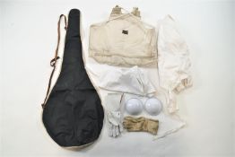 A ladies fencing kit (right handed), comprising a jacket, under jacket, coaches palsteron,