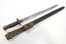 An English Wilkinson 1907 pattern bayonet with original frog and an associated scabbard,