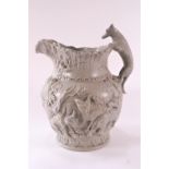 A Minton No 17 high relief hunting jug in drab green, decorated with scenes of foxes and hounds,