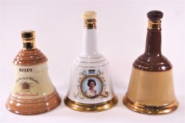 A collection of Wade stoneware Bells Whisky handbell shaped flagons (7), all empty,