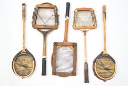 A pair of wooden framed squash racquets and another together with two wooden framed tennis racquets