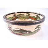 A Royal Doulton golfing bowl,