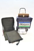 A Shakespeare tackle box with reels, floats,