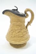 A Ridgway & Co buff stoneware relief moulded jug with pewter hinged lid depicting Tam O'Shanter