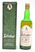 One boxed bottle of Talisker eight year old single malt whisky, 75 cl 45.