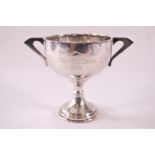 Sporting Interest - A silver two handled trophy with hemispherical bowl on a baluster stem with