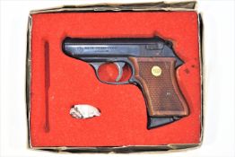 A semi automatic starting pistol,