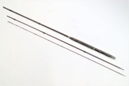 An unbranded vintage three piece 11 foot cane with brass ferrules rod fly,