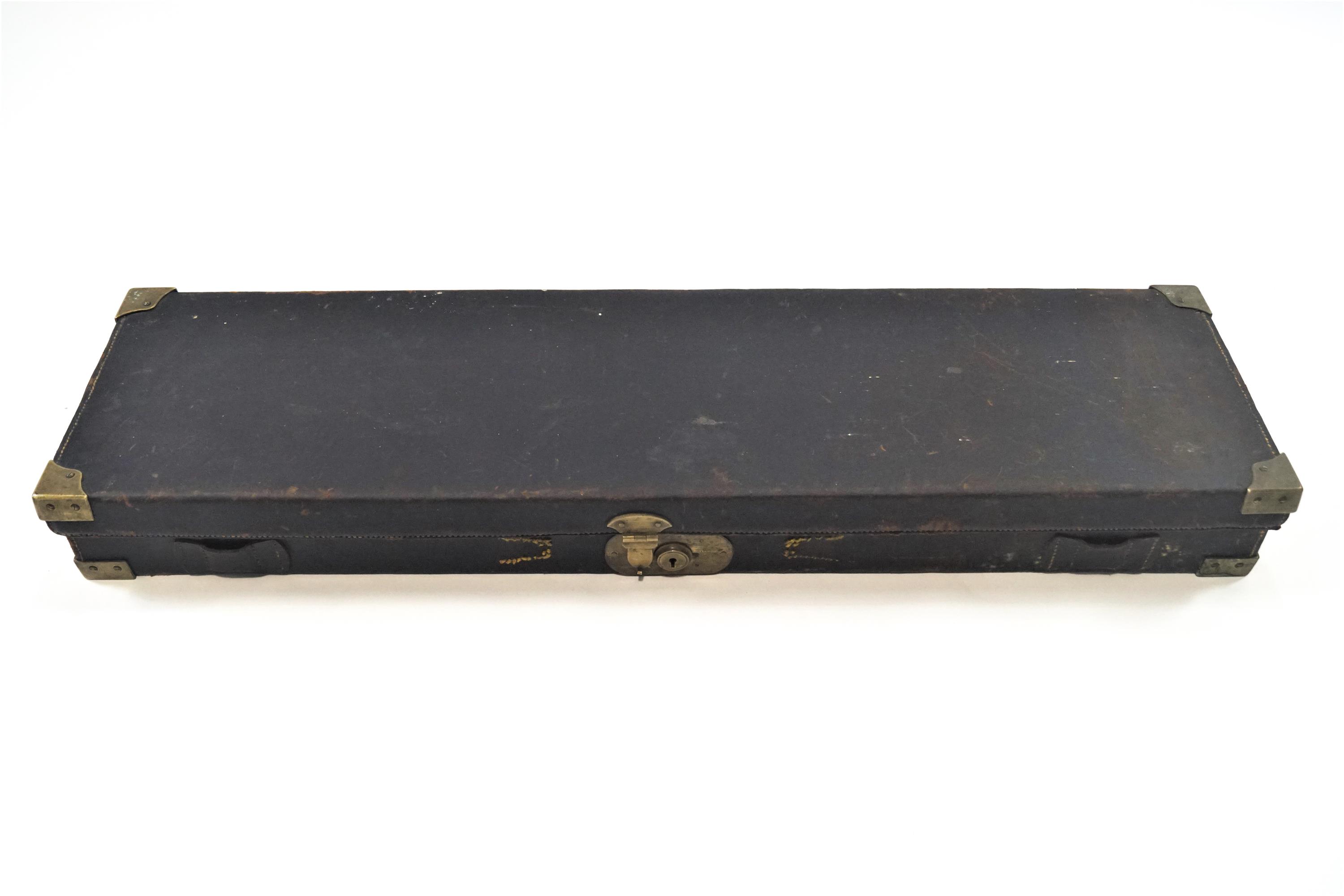 A period leather rigid rectangular gun case with brass mounted corners ...