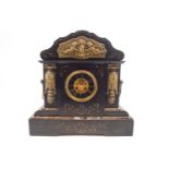A Victorian slate and marble mantel clock, the enamel dial with visible anchor escapement,