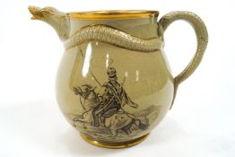 A 19th century Staffordshire pottery jug moulded with a snake handle and spout,