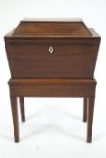 A 19th century style mahogany cellarette workbox of rectangular form,