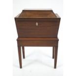 A 19th century style mahogany cellarette workbox of rectangular form,