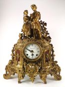 A brass cased 18th century French style mantel clock,