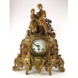 A brass cased 18th century French style mantel clock,