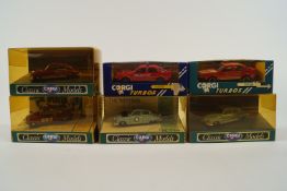 A group of fourteen boxed Corgi classic models,