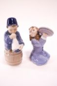 Two Royal Copenhagen figures, Girl with pot lids No 3677 and Boy with horn,