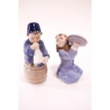 Two Royal Copenhagen figures, Girl with pot lids No 3677 and Boy with horn,