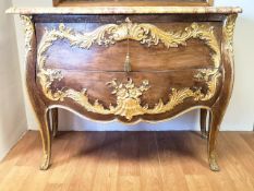 An oak 18th century French style bow front bombe commode with applied carved wood and gesso gilt