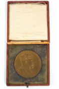 A pair of cased 1902 Coronation medals in white metal and bronze,