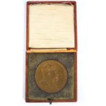 A pair of cased 1902 Coronation medals in white metal and bronze,